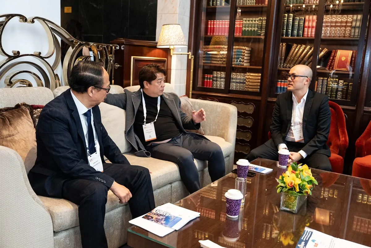 Mining industry professionals networking during a business meeting at 121 Hong Kong